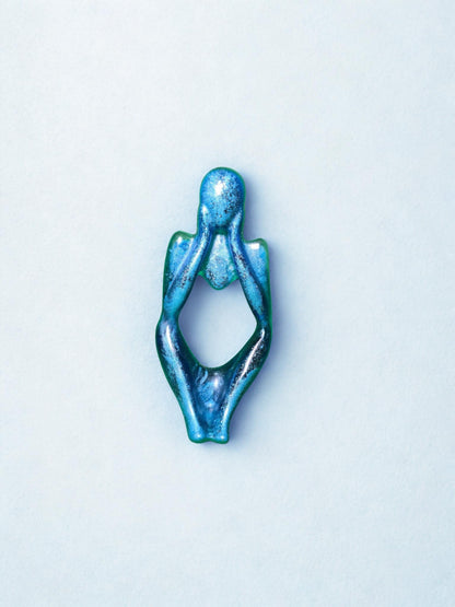 statuettes bleues en résine